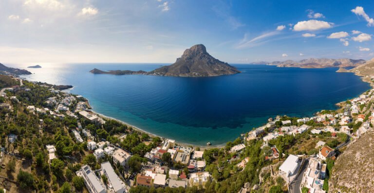 Panoramic landscape of Telendos island in distance and part of Kalymnos island, Massouri, Greece